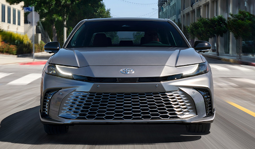 2025 Toyota Camry midsize sedan with elegant design and sharp front fascia